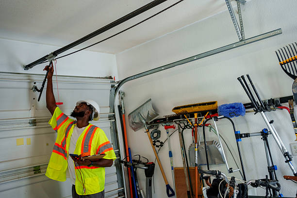 Professional Garage Door technician working in Roma, TX